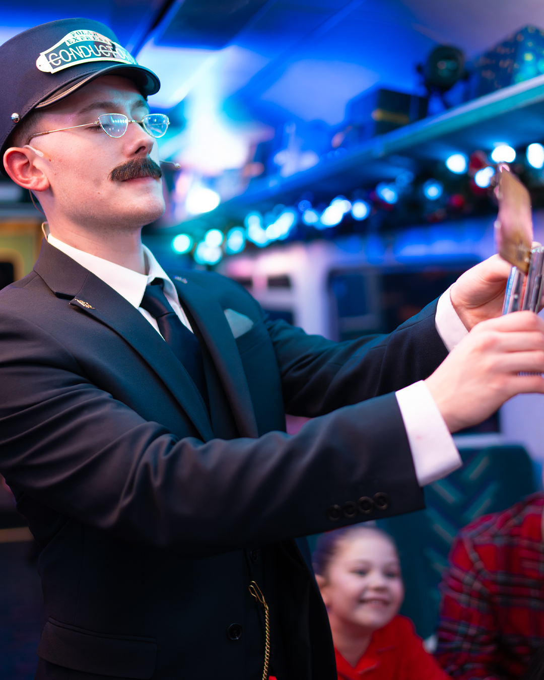 conductor on board the polar express train ride